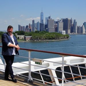 Kevin M Grubb of Q Cruise + Travel on Queen Mary 2 in New York City
